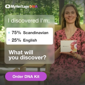 MyHeritage DNA kit and family tree on a desk